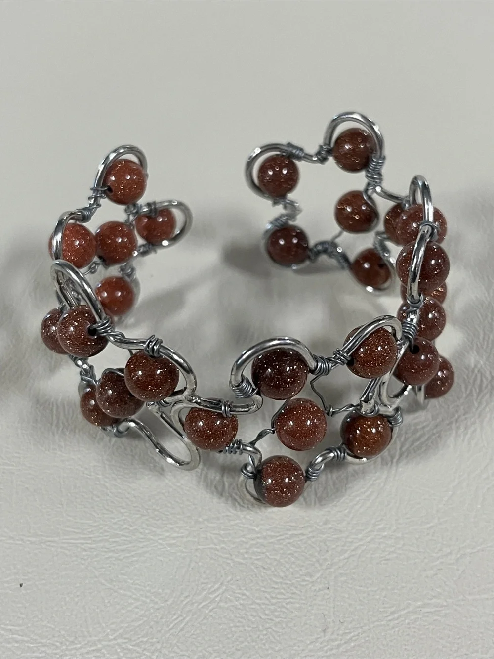 Sparkling Goldstone Bead Wire Cuff Bracelet